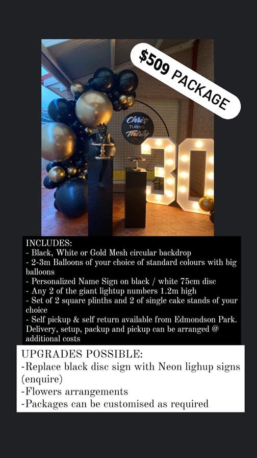 $509 black n gold big balloons